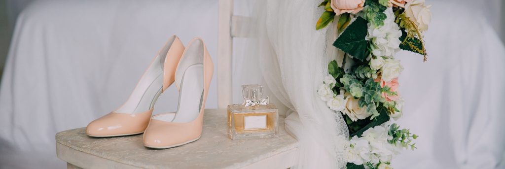 a photo of bridal accessories shoes perfume flowers