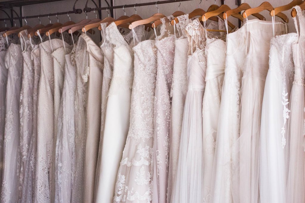 photo of wedding dresses on hangers