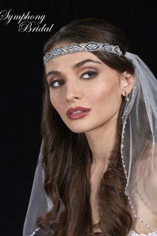 woman in marionat symphony bridal headpiece