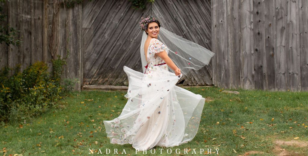 photo of bride spinning in dress