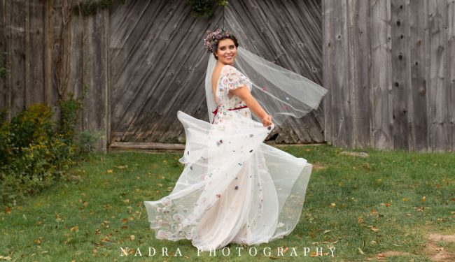 photo of bride spinning in dress