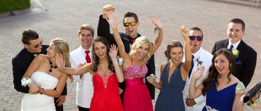 group of high school teens excited for prom